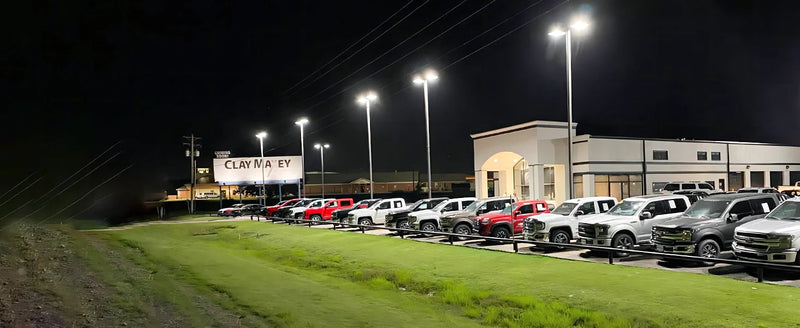 High-efficiency, industrial-type floodlights provide lighting for semi-truck parking lots