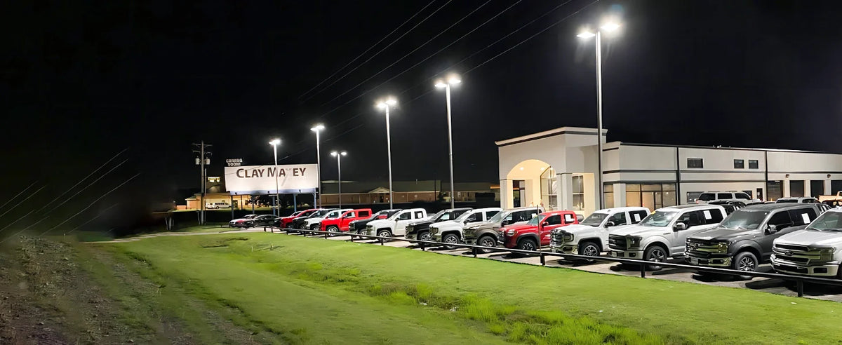 High-efficiency, industrial-type floodlights provide lighting for semi-truck parking lots